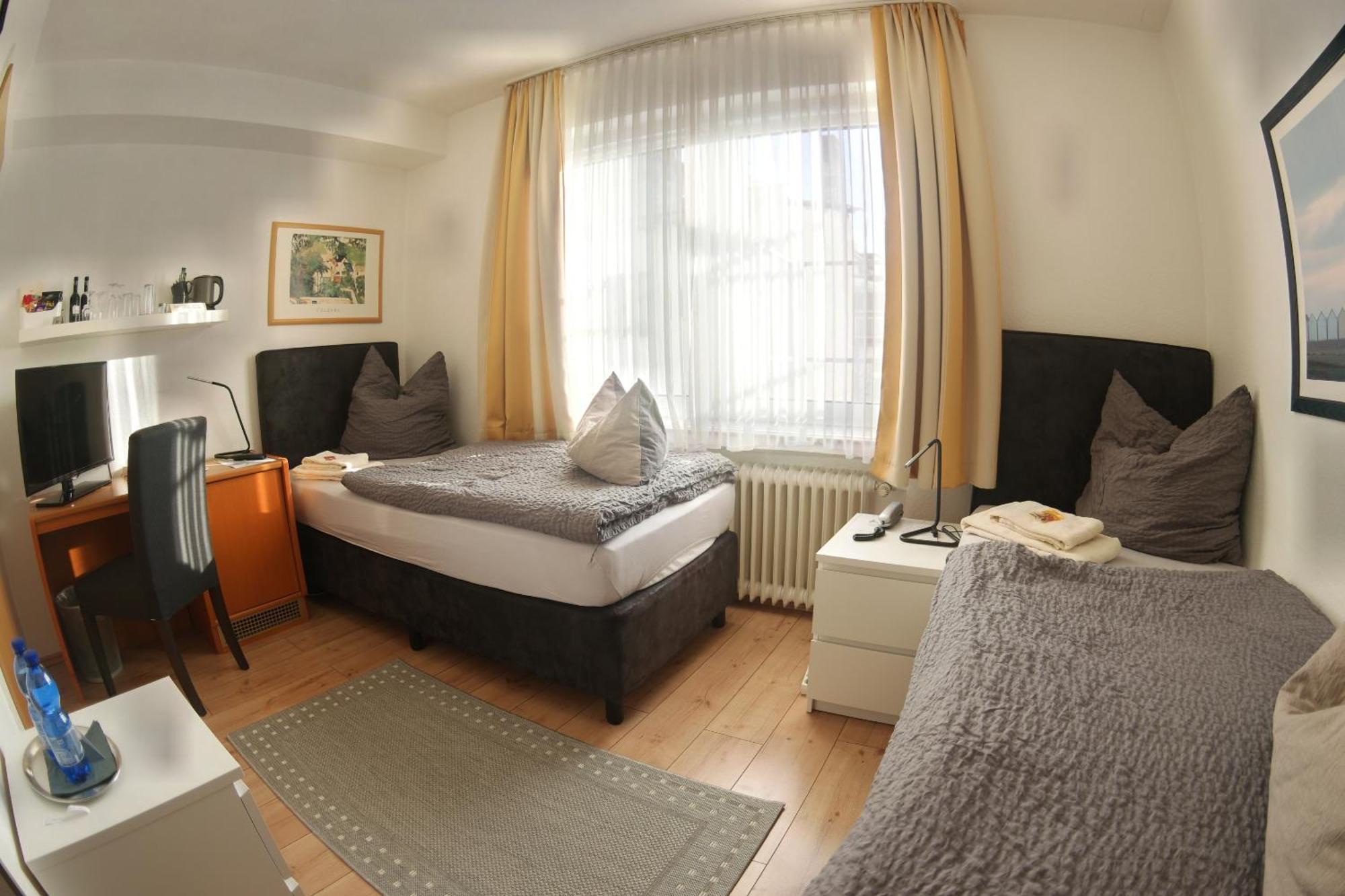 Hotel Merlin Garni Кельн Номер фото
